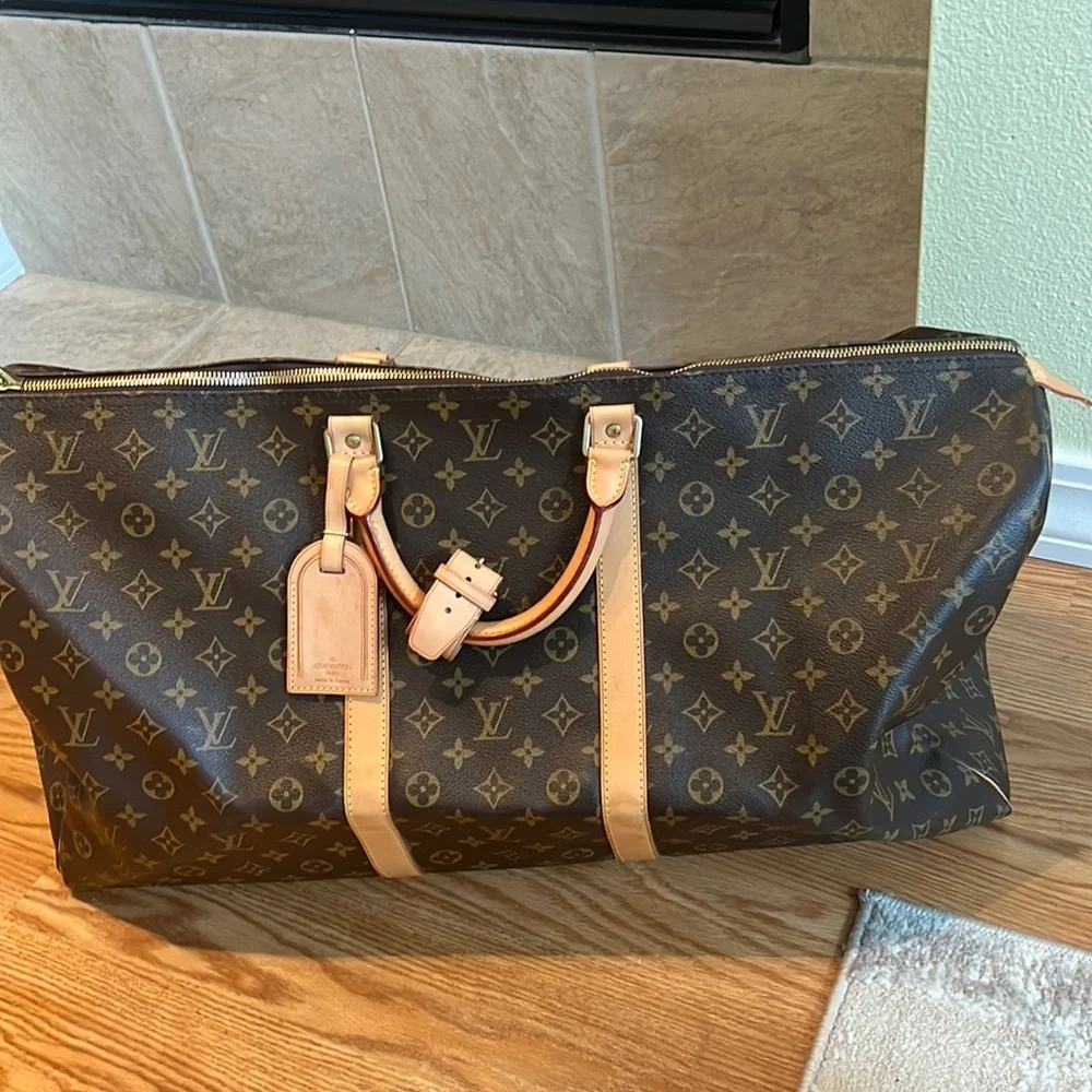 - Amazing Keepall bag by Louis Vuitton